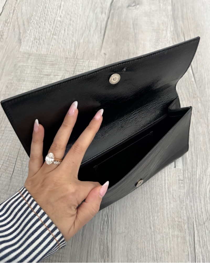 Sleek Black Leather Clutch by YSL - Pickle